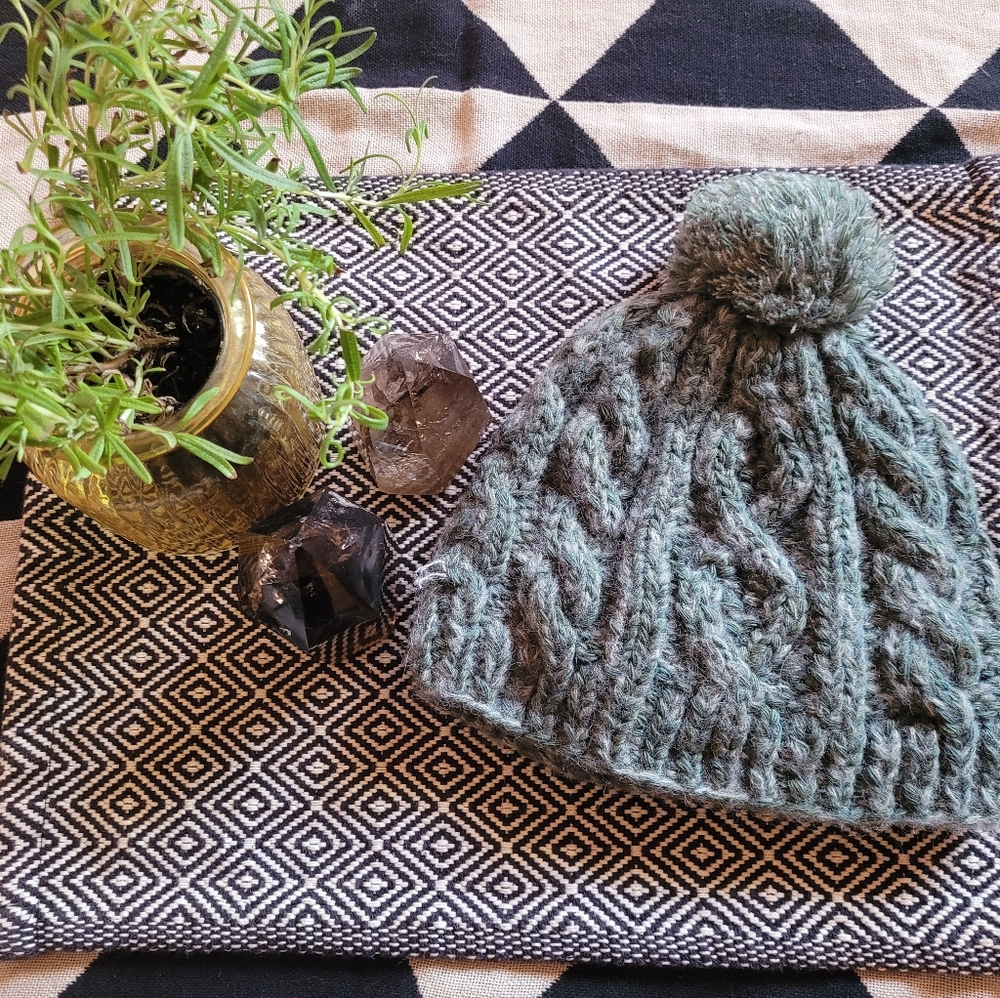 Cozy sage green beanie with pom
